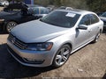 2014 Volkswagen Passat — photo 2 of 16 | VIN 1VWCN7A37EC056455