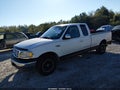 1999 Ford F-150 — photo 2 of 11 | VIN 1FTRX17W8XNA10078