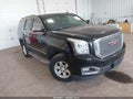 2015 GMC Yukon — photo 1 of 16 | VIN 1GKS2BKC2FR131235