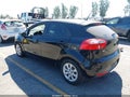 2013 Kia Rio — photo 3 of 18 | VIN KNADM5A39D6099820