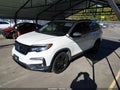 2022 Honda Pilot — photo 2 of 16 | VIN 5FNYF6H20NB058466