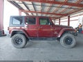 2009 Jeep Wrangler Unlimited — photo 13 of 16 | VIN 1J4GA591X9L756364