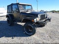 1998 Jeep Wrangler — photo 1 of 12 | VIN 1J4FY19S5WP797627