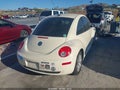 2010 Volkswagen Beetle — photo 4 of 17 | VIN 3VWRW3AG4AM027295