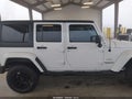 2013 Jeep Wrangler Unlimited — photo 14 of 17 | VIN 1C4BJWEG9DL680242