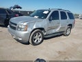 2011 Chevrolet Tahoe — photo 2 of 16 | VIN 1GNSCBE03BR376623