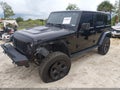 2015 Jeep Wrangler Unlimited — photo 2 of 17 | VIN 1C4BJWEG8FL743723