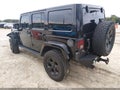 2015 Jeep Wrangler Unlimited — photo 3 of 17 | VIN 1C4BJWEG8FL743723
