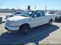 2003 Ford F-150 — photo 2 of 16 | VIN 2FTRX172X3CA34699