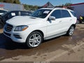 2014 Mercedes-Benz ML-Class — photo 2 of 22 | VIN 4JGDA5JB7EA420587