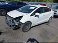 2013 Kia Rio — photo 2 of 13 | VIN KNADM4A3XD6132222
