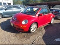 2009 Volkswagen Beetle — photo 2 of 16 | VIN 3VWRF31Y79M403461