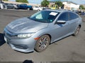 2018 Honda Civic — photo 2 of 18 | VIN 2HGFC2F74JH528365