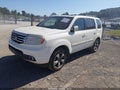 2015 Honda Pilot — photo 2 of 16 | VIN 5FNYF4H33FB048805