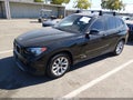 2014 BMW X1 — photo 2 of 11 | VIN WBAVL1C51EVY14451
