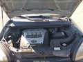 2005 Hyundai Tucson — photo 10 of 11 | VIN KM8JN72D45U207209