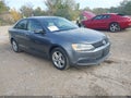 2014 Volkswagen Jetta — photo 1 of 11 | VIN 3VWLL7AJ7EM418321