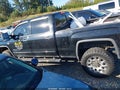 2015 GMC Sierra — photo 13 of 15 | VIN 1GT110E82FF100199