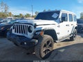 2022 Jeep Wrangler Unlimited — photo 2 of 16 | VIN 1C4HJXEN9NW237121