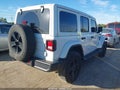 2022 Jeep Wrangler Unlimited — photo 4 of 16 | VIN 1C4HJXEN9NW237121