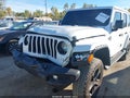 2022 Jeep Wrangler Unlimited — photo 6 of 16 | VIN 1C4HJXEN9NW237121