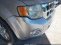 2011 Ford Escape — photo 14 of 16 | VIN 1FMCU0D76BKB35057