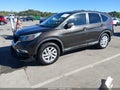 2015 Honda CR-V — photo 2 of 17 | VIN 2HKRM3H57FH529678