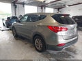 2016 Hyundai Santa Fe — photo 3 of 16 | VIN 5XYZT3LB2GG340204