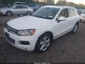 2014 Volkswagen Touareg — photo 2 of 17 | VIN WVGEF9BP3ED001464