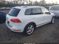 2014 Volkswagen Touareg — photo 4 of 17 | VIN WVGEF9BP3ED001464