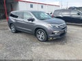 2017 Honda Pilot — photo 1 of 18 | VIN 5FNYF5H59HB038970