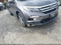 2017 Honda Pilot — photo 6 of 18 | VIN 5FNYF5H59HB038970