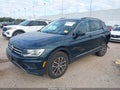 2018 Volkswagen Tiguan — photo 2 of 19 | VIN 3VV3B7AX5JM191670