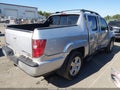 2009 Honda Ridgeline — photo 4 of 16 | VIN 5FPYK16559B109176