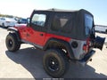 2000 Jeep Wrangler — photo 3 of 12 | VIN 1J4FA49S4YP713824
