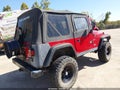 2000 Jeep Wrangler — photo 4 of 12 | VIN 1J4FA49S4YP713824