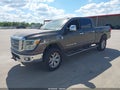 2016 Nissan Titan — photo 2 of 16 | VIN 1N6BA1F42GN506347