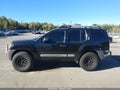 2011 Nissan Xterra — photo 14 of 16 | VIN 5N1AN0NU9BC519434