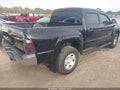 2013 Toyota Tacoma — photo 4 of 16 | VIN 5TFLU4EN8DX052776