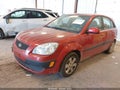 2009 Kia Rio — photo 2 of 11 | VIN KNADE243696547865