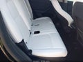 2025 Tesla Model Y — photo 8 of 15 | VIN 7SAYGAEE7SF217724