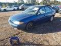 1999 Ford Escort — photo 2 of 11 | VIN 1FAFP10P6XW229708