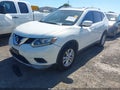 2014 Nissan Rogue — photo 2 of 14 | VIN 5N1AT2MV6EC827726