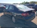 2010 Volkswagen Jetta — photo 3 of 13 | VIN 3VWAX7AJ1AM128503
