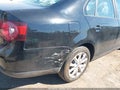 2010 Volkswagen Jetta — photo 6 of 13 | VIN 3VWAX7AJ1AM128503