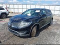2016 Lincoln MKX — photo 2 of 16 | VIN 2LMTJ6LRXGBL41972