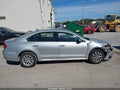 2015 Volkswagen Passat — photo 14 of 17 | VIN 1VWAT7A36FC054128