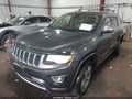 2014 Jeep Grand Cherokee — photo 2 of 16 | VIN 1C4RJFCG7EC135630