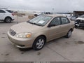 2004 Toyota Corolla — photo 2 of 19 | VIN 1NXBR32E84Z248354