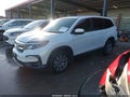 2020 Honda Pilot — photo 2 of 18 | VIN 5FNYF6H35LB006207